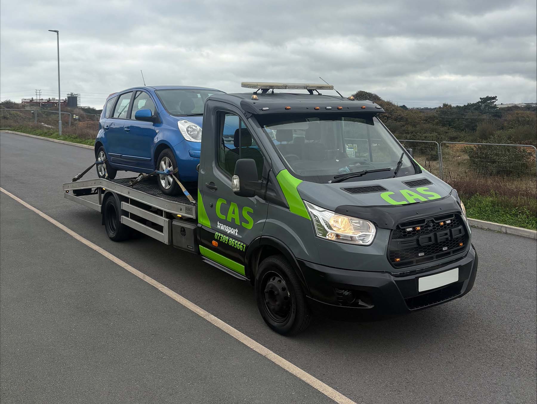 Cas Transport picking up a blue Nissan in Cornwall